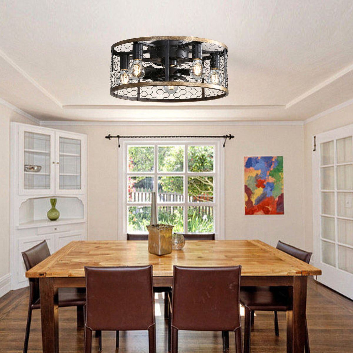 Black caged flush-mount ceiling fan with lit bulbs and wood-tone rim