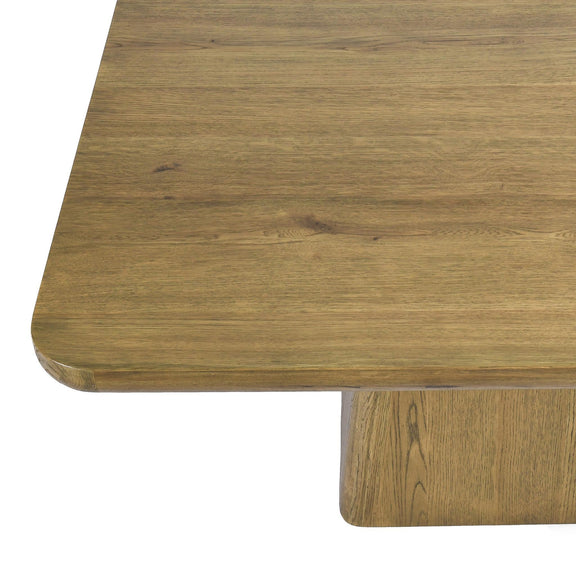 Wood dining table top corner with rounded edge and leg connection grain