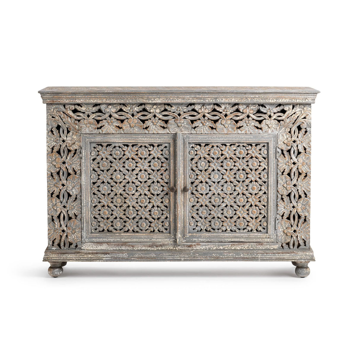 Front view of carved 2-door sideboard with ornate floral panels and distressed gray finish