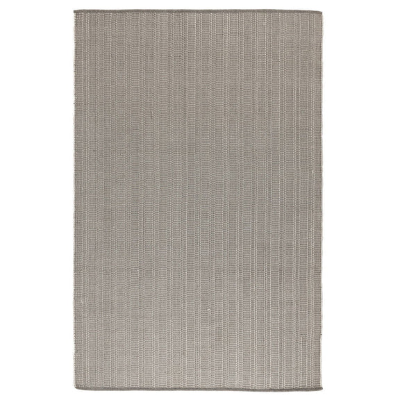 Pebble gray indoor/outdoor rug with tight flat woven pattern and bound edges.