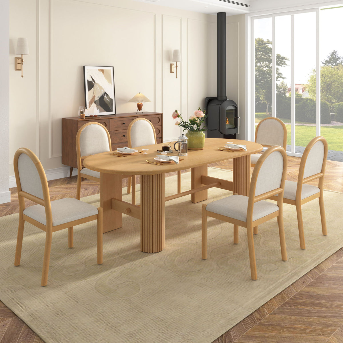 Light brown oval dining table with six upholstered chairs, fabric seats and rounded arched backs