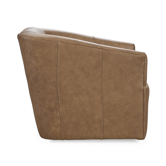 Brown upholstered swivel chair side view with rounded back and panel stitching