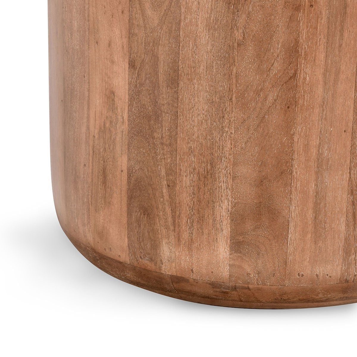 Umber wood round table base with vertical grain and curved bottom edge.