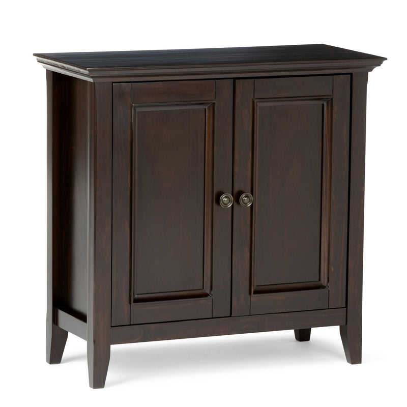 Amherst low storage cabinet in hickory brown with two paneled doors and round knobs