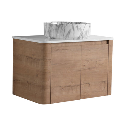 Wall-mounted bathroom vanity with white marble-look vessel sink and light wood cabinet