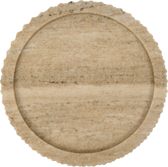 Close-up of round beige genuine marble tray with textured scalloped edge