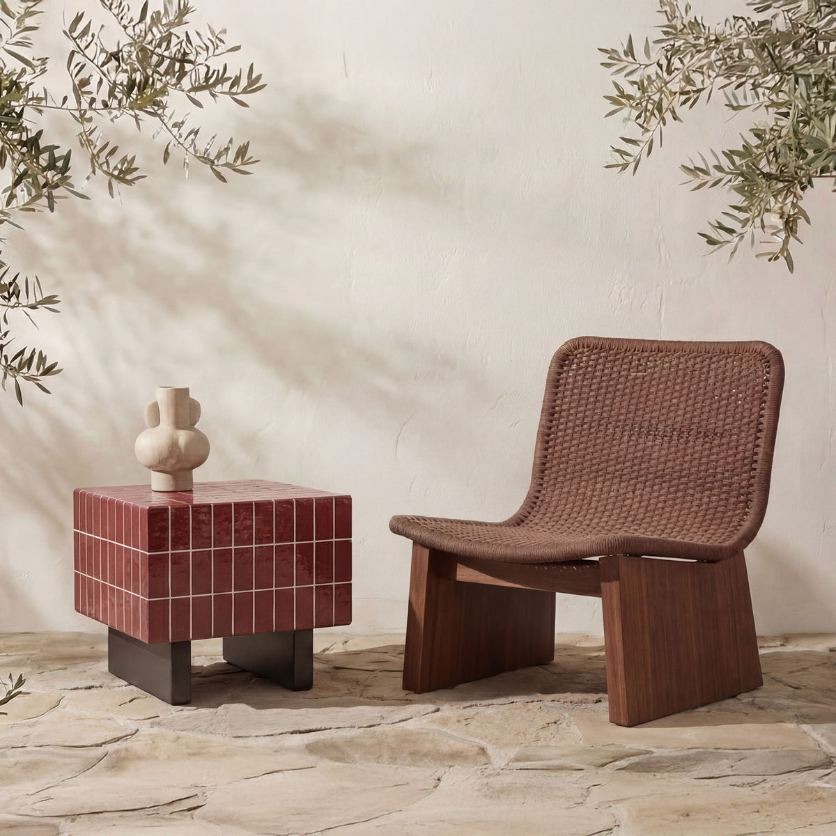 Brown outdoor side table with cube-tile wood top and dark legs