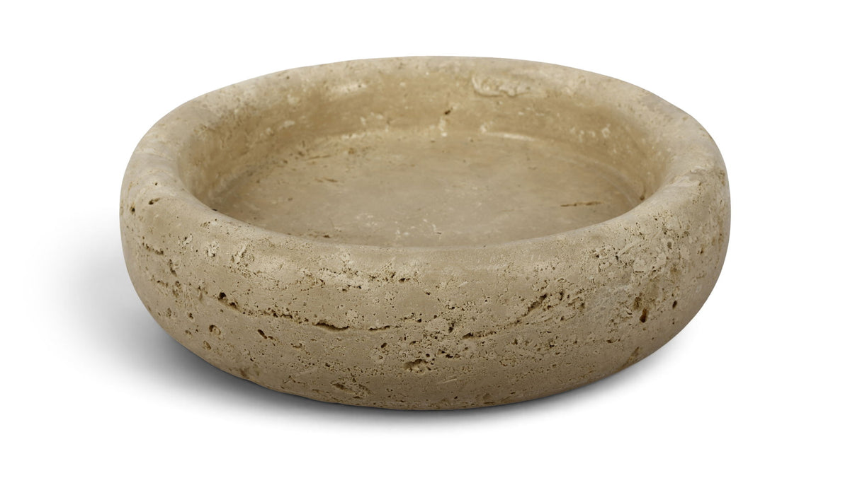 Beige genuine travertine tray with shallow round basin and speckled stone texture.