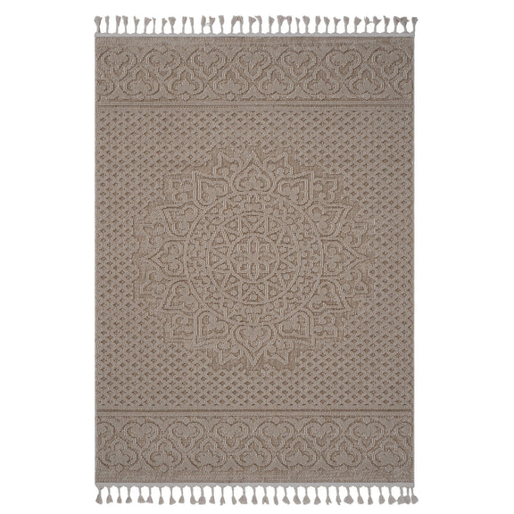 Light brown medallion indoor/outdoor rug with ornate center panel and tassel fringe ends