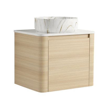 Light wood mounted bathroom vanity with white marble-pattern vessel sink and single door