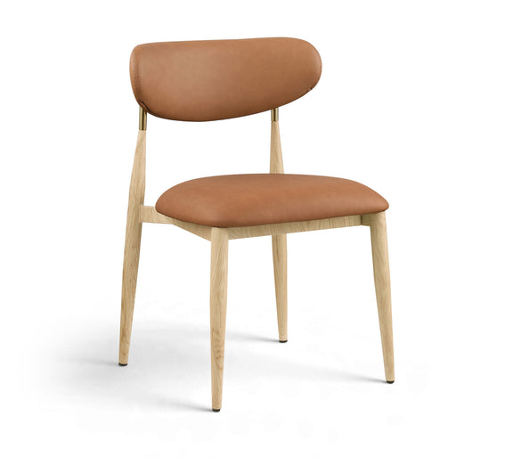 Cognac brown upholstered dining side chair with light wood legs and brass accents
