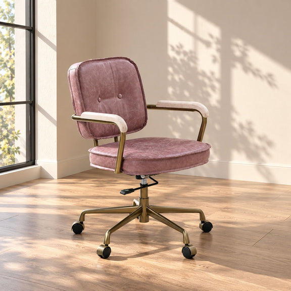 Pink upholstered office chair with tufted back, padded arms, and five-star wheeled base.