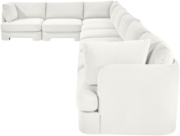 White velvet L-shaped sectional sofa with chaise and rounded arms