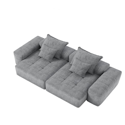 Dark gray modular sectional sofa with chaise and three back cushions