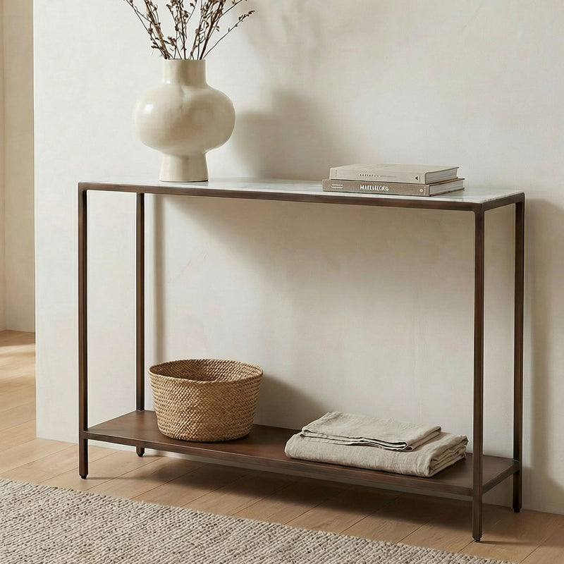 Brown console table with open lower shelf and slim legs