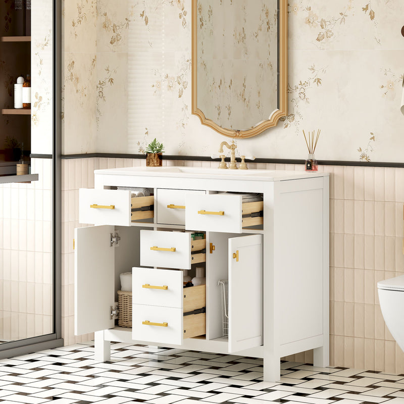 White bathroom vanity with sink, open drawers and doors revealing wood-tone drawer interiors