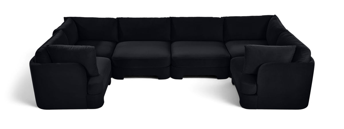 Black velvet U-shaped sectional sofa with padded backrest and wide arm sections