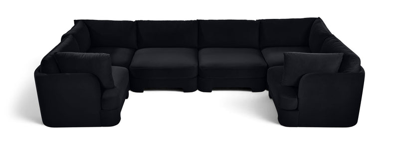 Black velvet U-shaped sectional sofa with padded backrest and wide arm sections