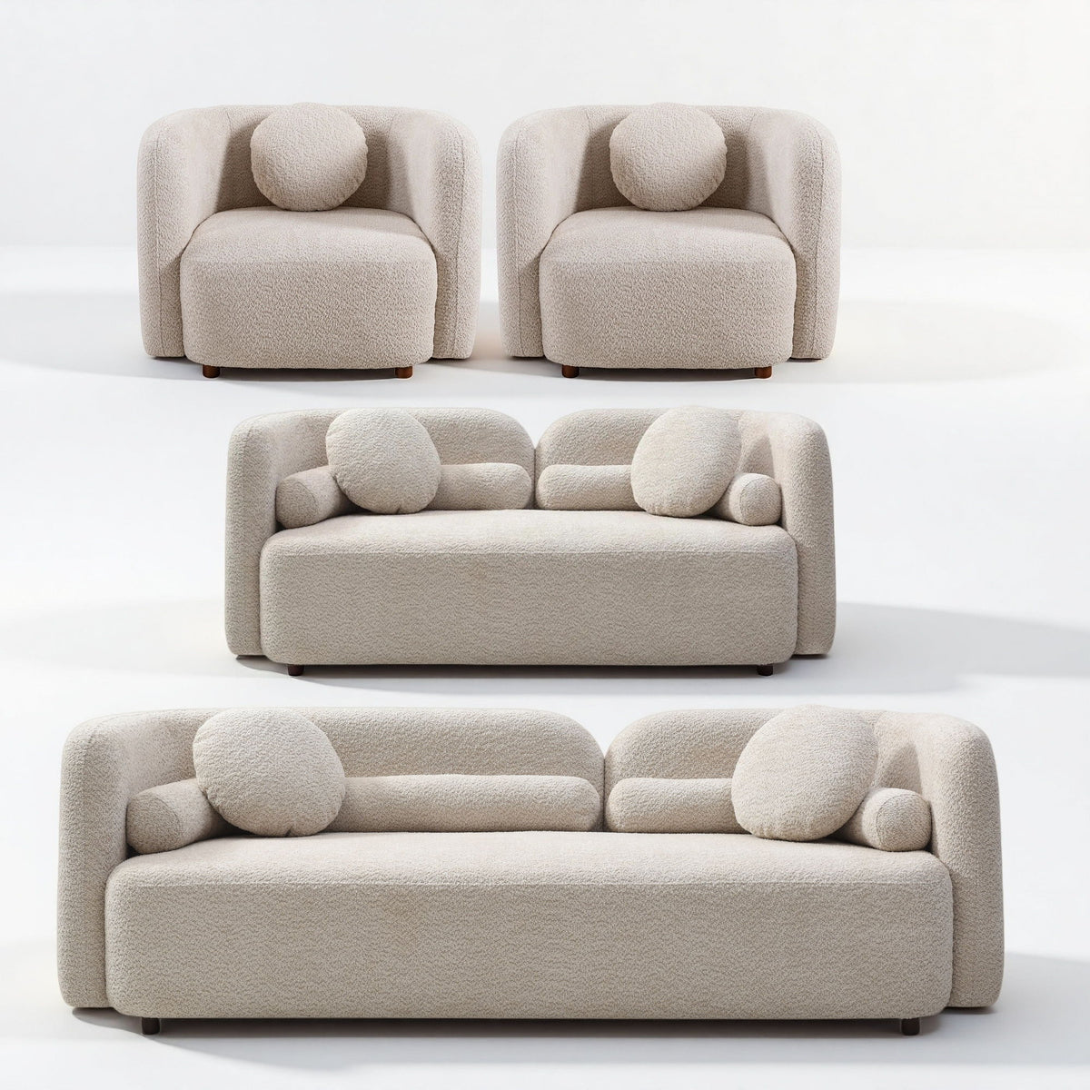 Beige upholstered sofa and loveseat with two armchairs, round accent cushions