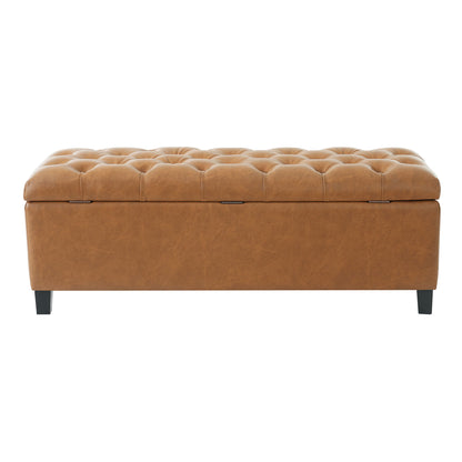 Light brown upholstered storage bench with tufted top and hinged lid.