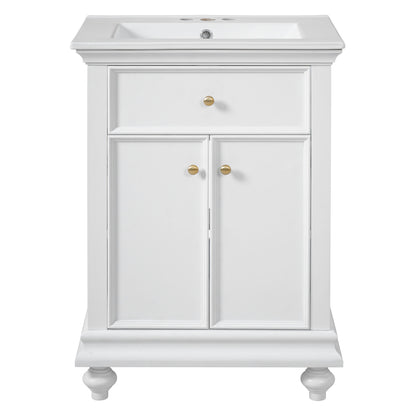 White bathroom vanity cabinet with white sink top, two doors, and brass knob pulls