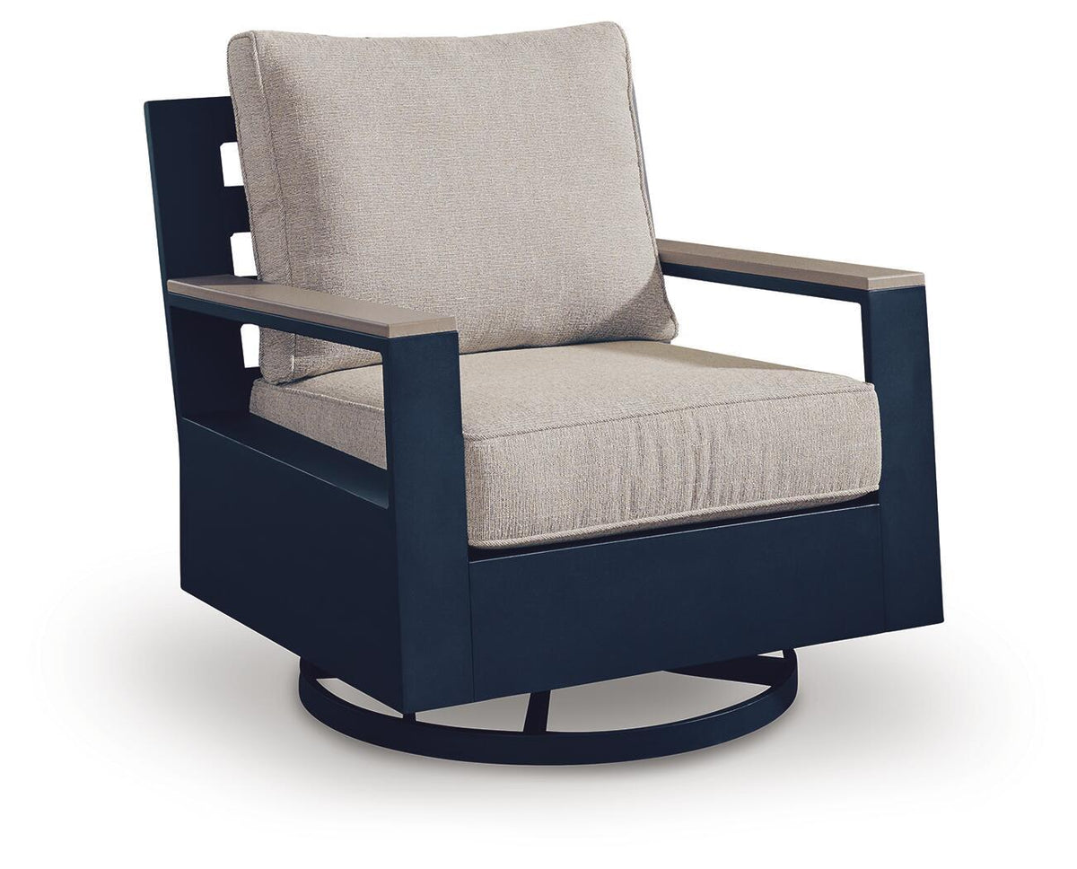 Blue swivel glider chair with light beige cushion, side view with slatted arm detail
