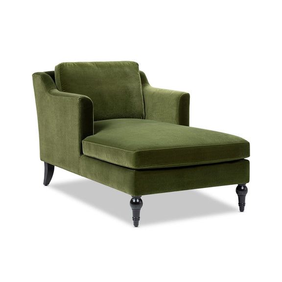 Green upholstered chaise lounge with curved arms and deep cushioned seat