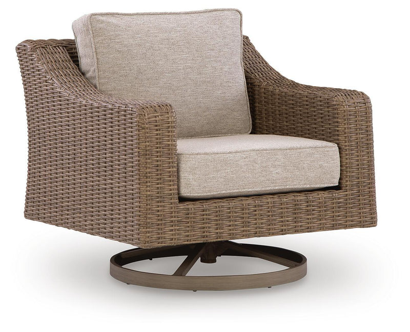 Beige cushioned woven rattan swivel lounge chair with dark round swivel base
