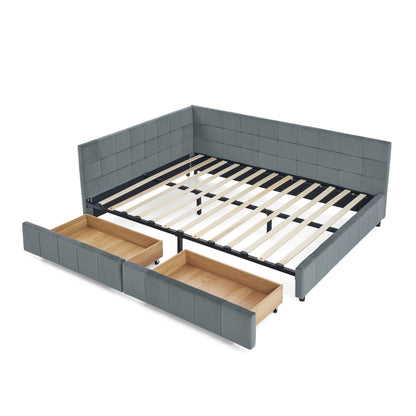 Dark gray upholstered tufted bed frame with open storage drawers and slatted base