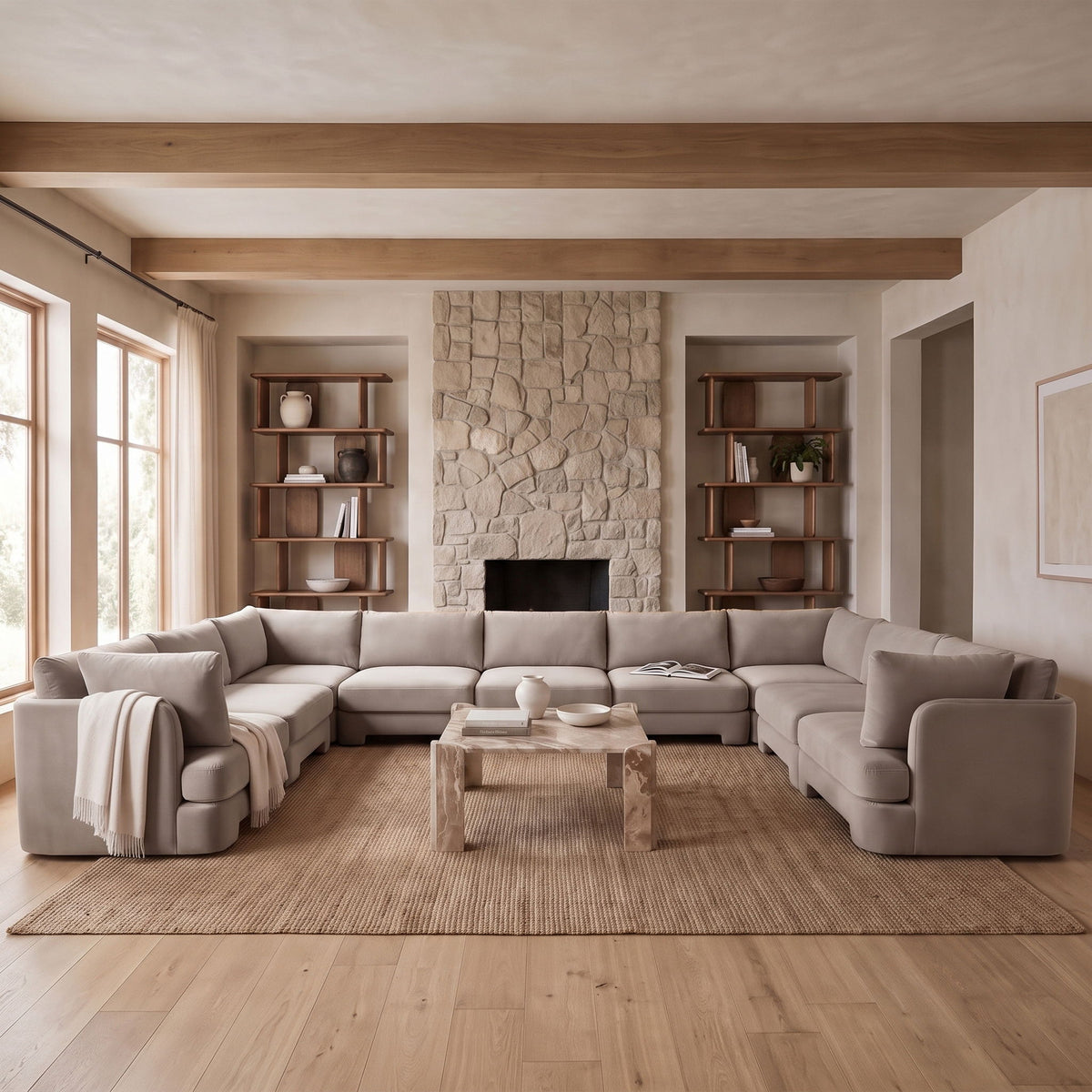 Light gray velvet modular sectional sofa with chaise, arranged in L-shape