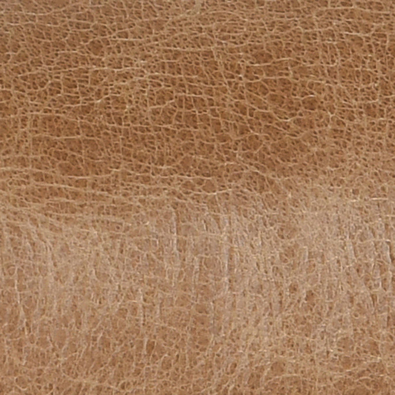 Tan leather upholstery texture close-up with fine grain pattern