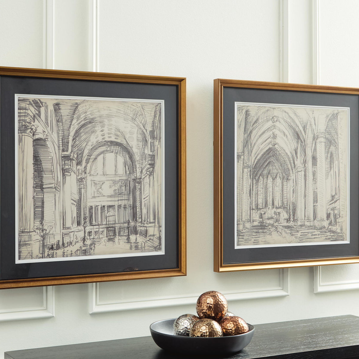 Set of 2 framed architectural sketch wall prints, brown frames with dark mats.