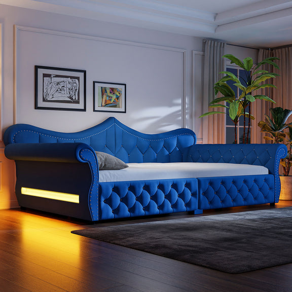 Blue upholstered daybed with tufted headboard and side LED strip