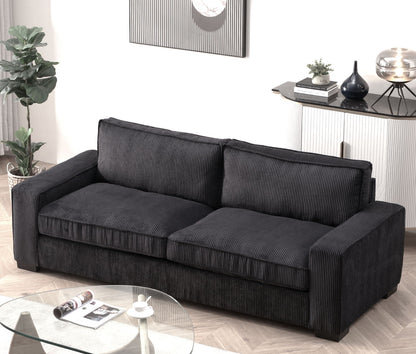 Dark gray 3-seater sofa with ribbed fabric upholstery and two back cushions