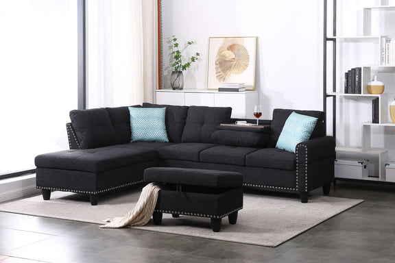 Dark gray sectional sofa with left-facing chaise, ottoman and blue accent pillows
