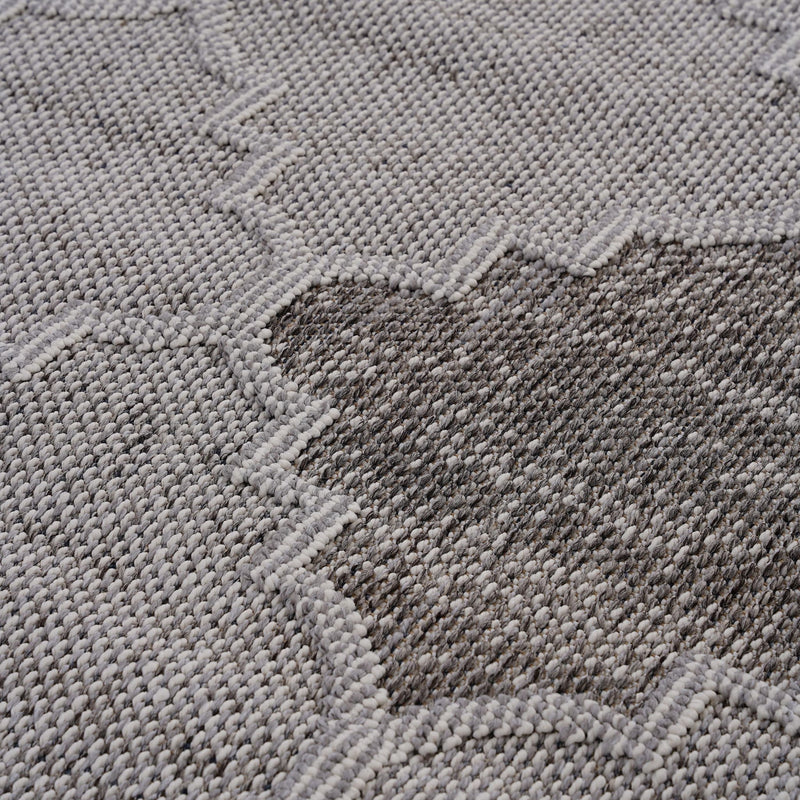 Textured trellis weave on gray and light gray indoor/outdoor area rug