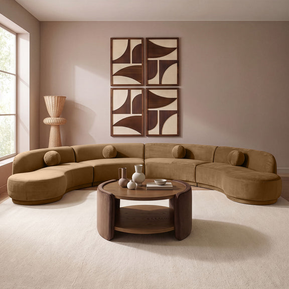 Light beige velvet sectional sofa with chaise, rounded arms and plush cushions