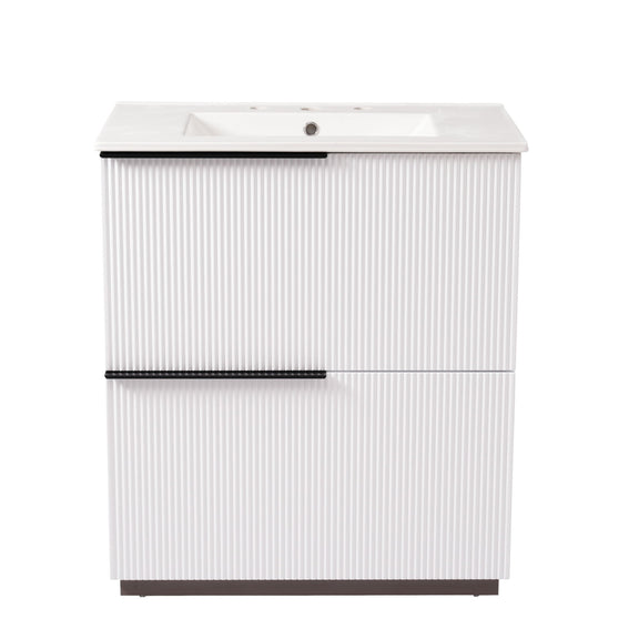 White fluted bathroom vanity with white ceramic sink and center handle bar