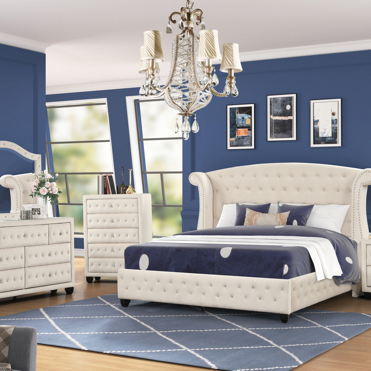Upholstered bedroom set with tufted bed, nightstand, dresser, and mirror in light upholstery.