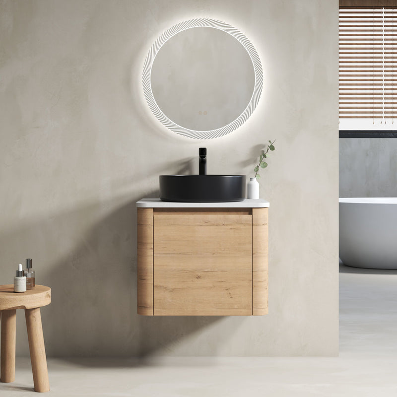 Wall-mounted bathroom vanity in light wood with white top and black round vessel sink