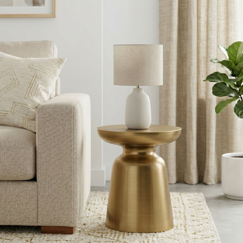 Gold round bell accent table with flared top and sculpted hourglass pedestal