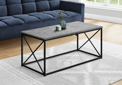 Rectangular table with gray stone-look top and black X-frame metal base