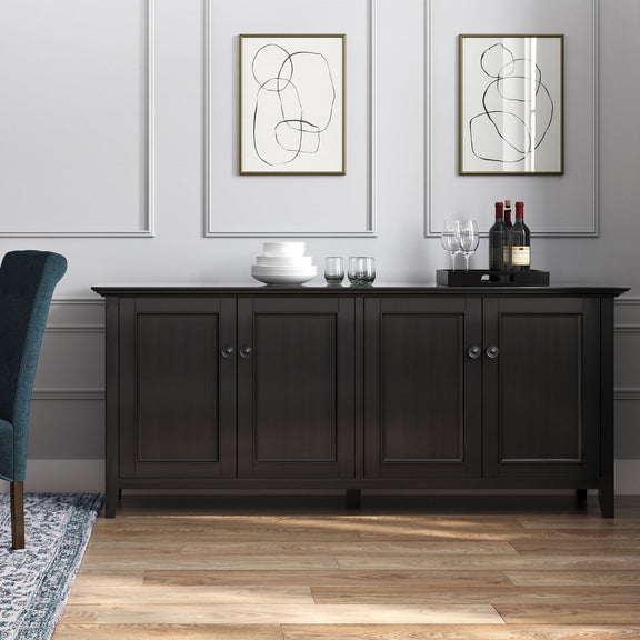 Wide four-door storage cabinet in dark brown with paneled doors and round knobs