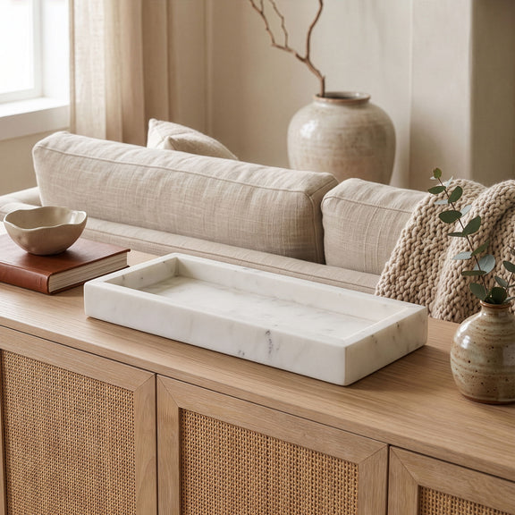 Rectangular white marble tray with faint gray veining and low side walls