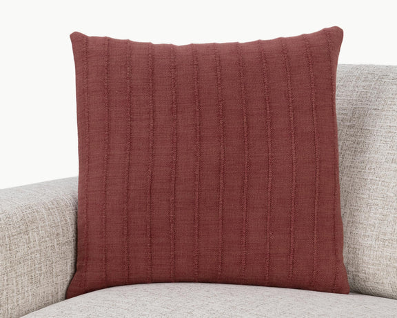 Hunter SLD pillow in cherrywood red on sofa, square front with vertical textured stripes