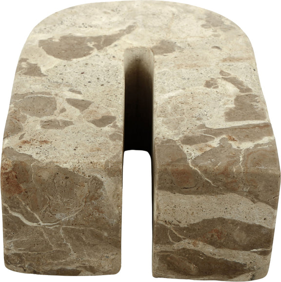 Beige marble bookend with arched cutout, stone veining and speckles