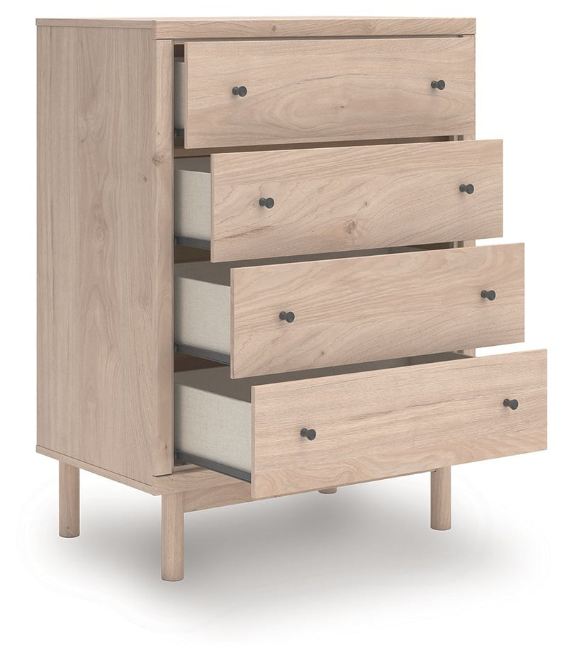 Wood four-drawer chest with drawers pulled open and black knobs