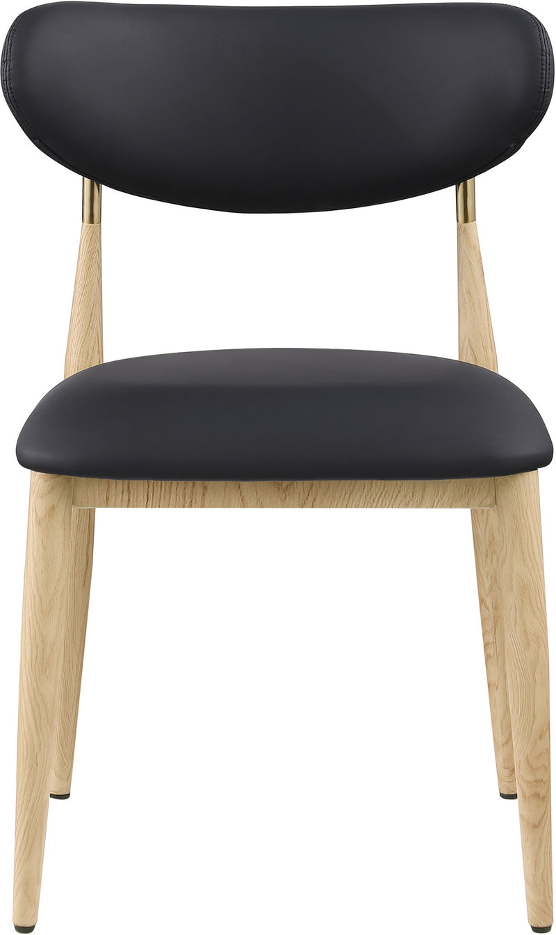 Vegan leather dining side chair with black cushioned seat and light wood legs