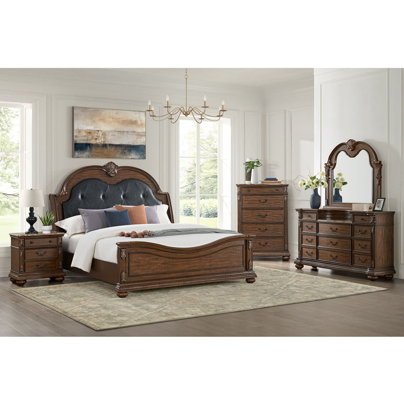 Brown wooden chest with four drawers and decorative metal drawer pulls