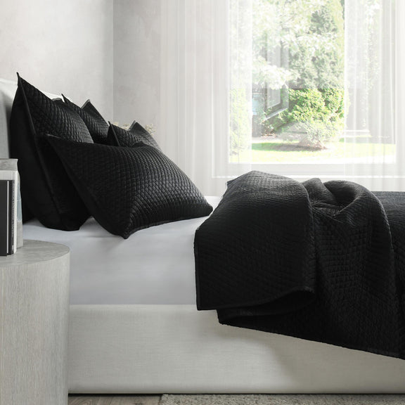 Onyx black diamond-quilt quilt set with multiple pillows